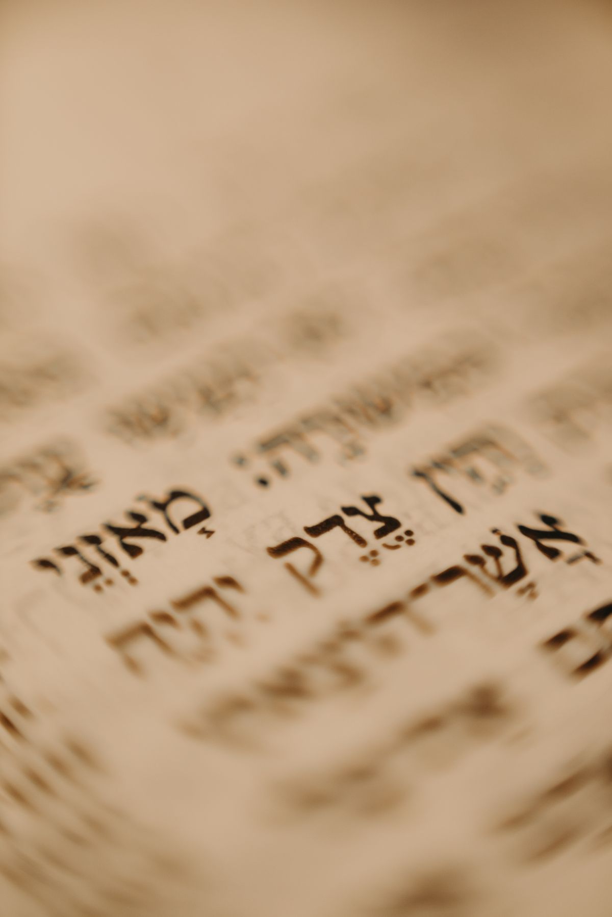 Hebrew lettering on parchment, close up