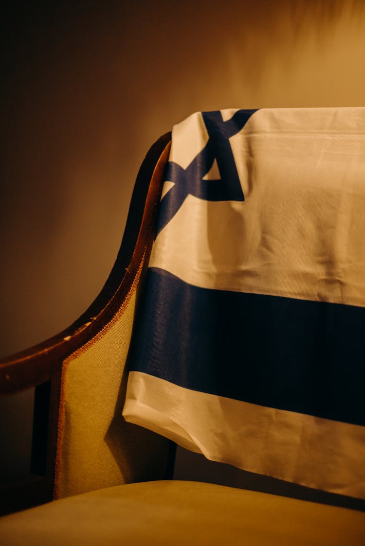 Israel Flag Folded On A Chair