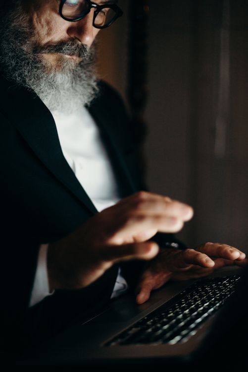 Photo Of An Old Man Using Laptop · Free Stock Photo