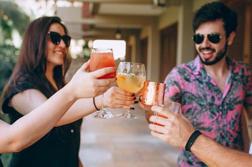 Free Photo Of People Holding Glasses Stock Photo