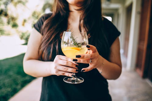 Photo Of Person Holding Wine Glass