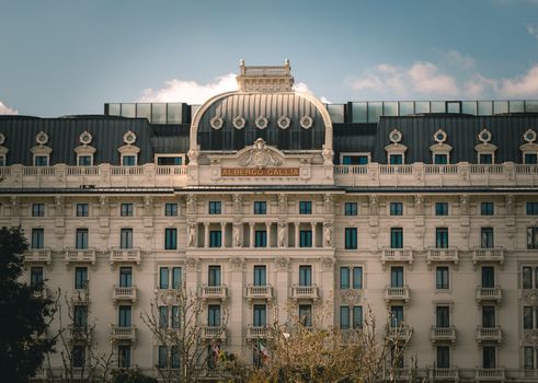 Captivating view of the classic Albergo Gallia facade in Milan, Italy.