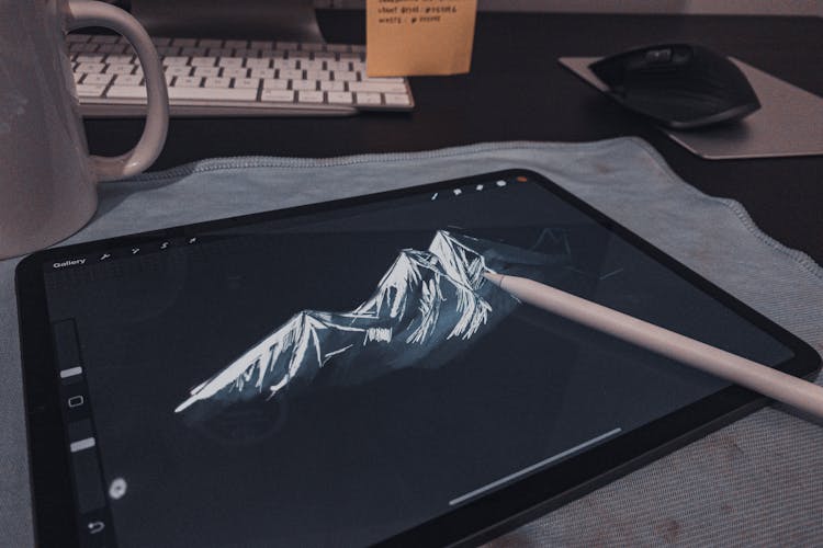 Graphic Tablet With Picture Of Mountain On Screen