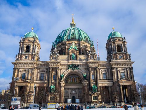 Free Front view of the iconic Berlin Cathedral under a clear winter sky, showcasing its stunning architecture. Stock Photo