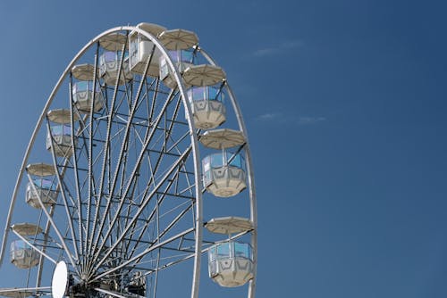 White Ferris Wheel Under the Blue Sky