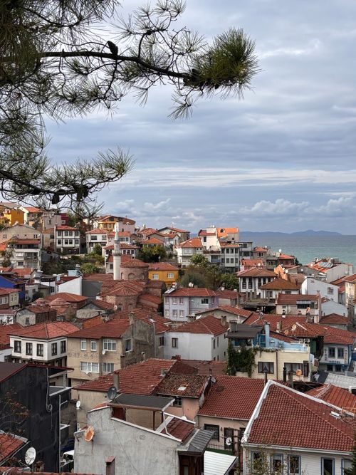 Free Charming red-roofed houses overlooking the sea in Bursa, Turkey's coastal landscape. Stock Photo