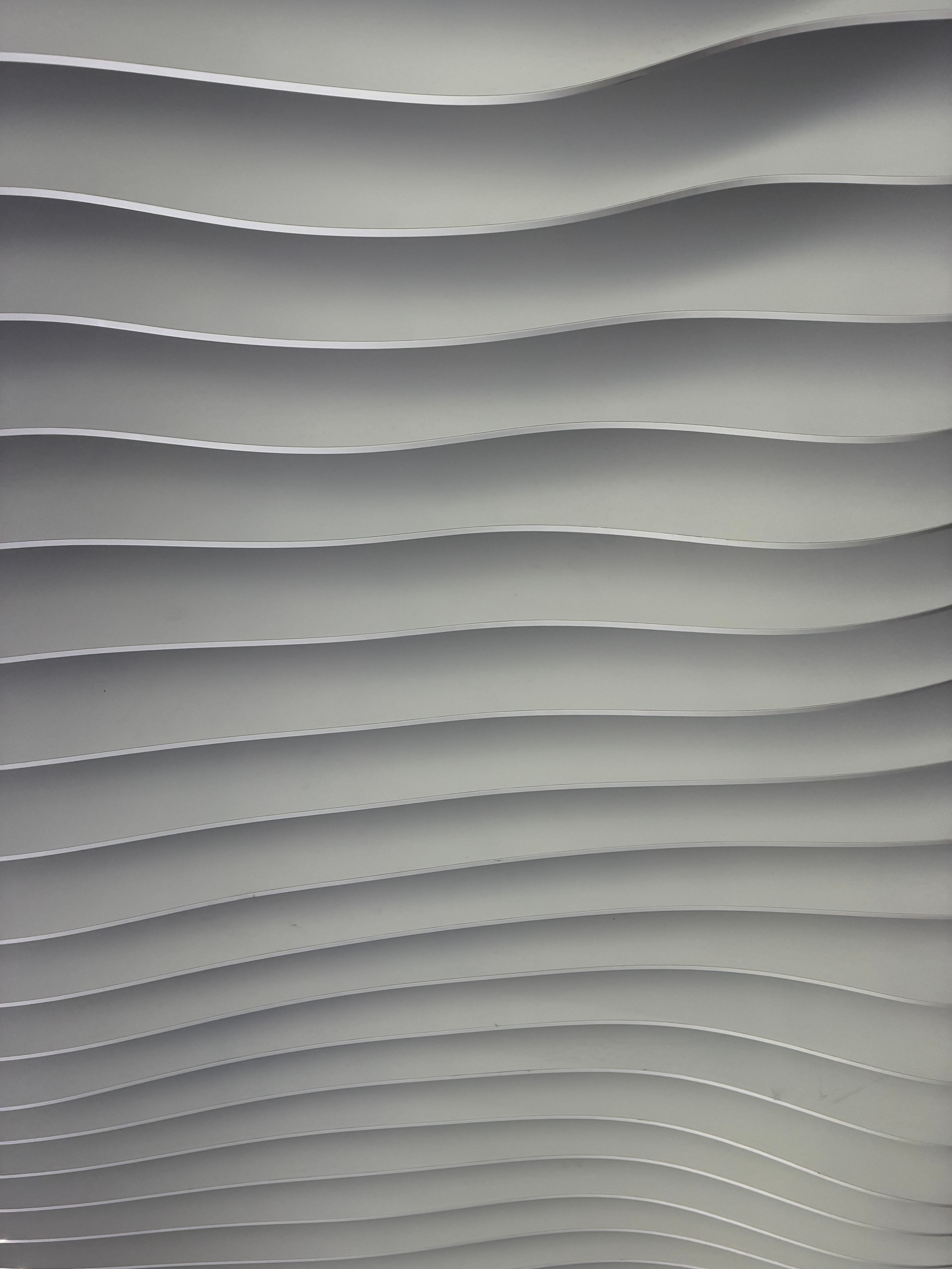Abstract Wavy Grey Wall Pattern in Modern Interior · Free Stock Photo