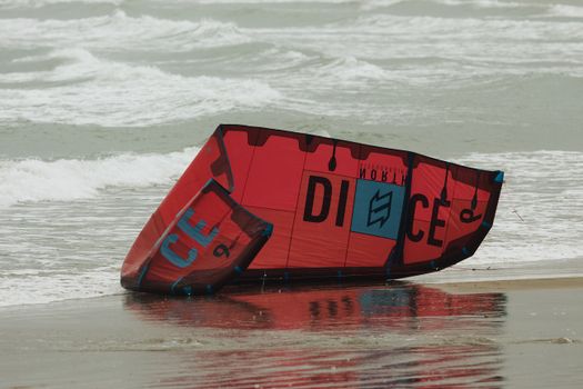 Red and Black Surfing Board on Water
