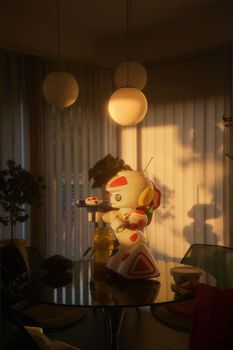 Retro robot toy on glass table with warm sunlight and retro decor.