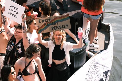 Free Vibrant celebration at Amsterdam Pride Parade highlighting LGBTQ+ activism and unity. Stock Photo