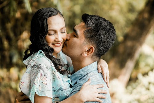 Free Photo Of Man Kissing Woman  Stock Photo