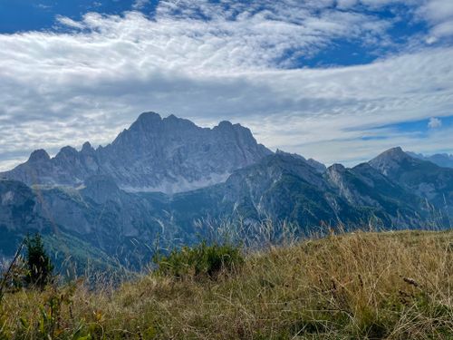 Free Stunning landscape of the Dolomites with grassy foreground and dramatic sky. Stock Photo