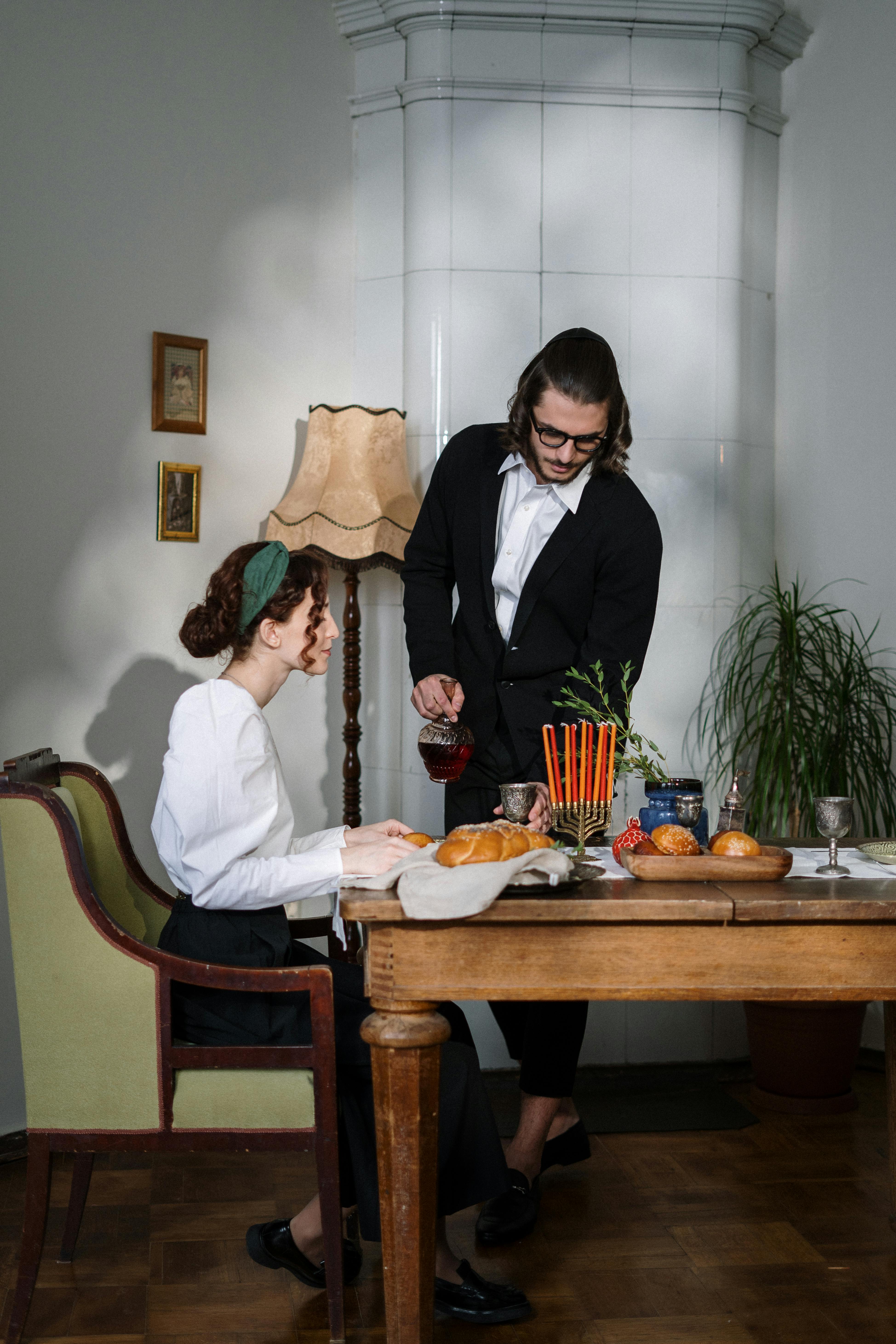 couple having traditional jewish food