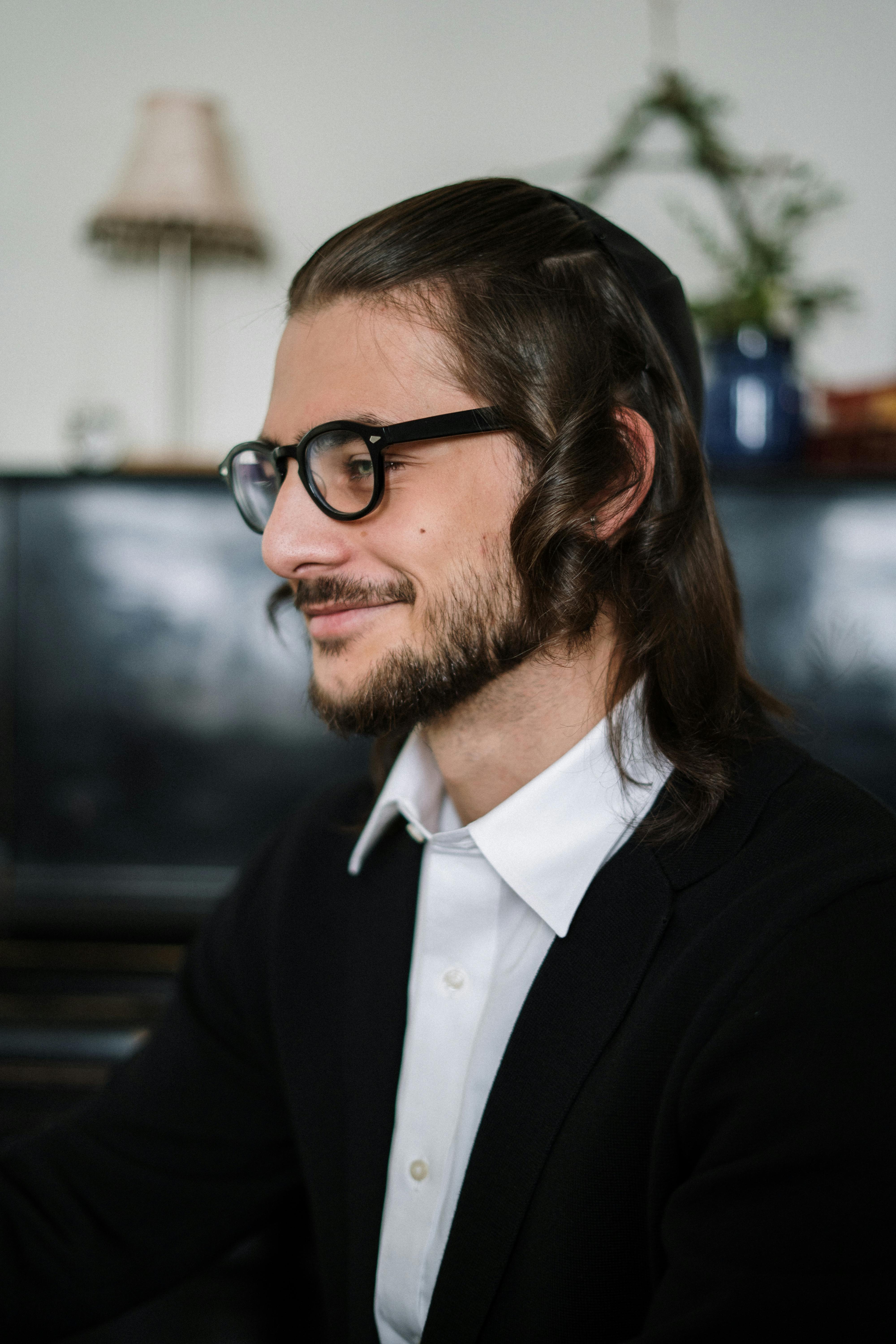 Bearded Man with Long Hair and Glasses · Free Stock Photo