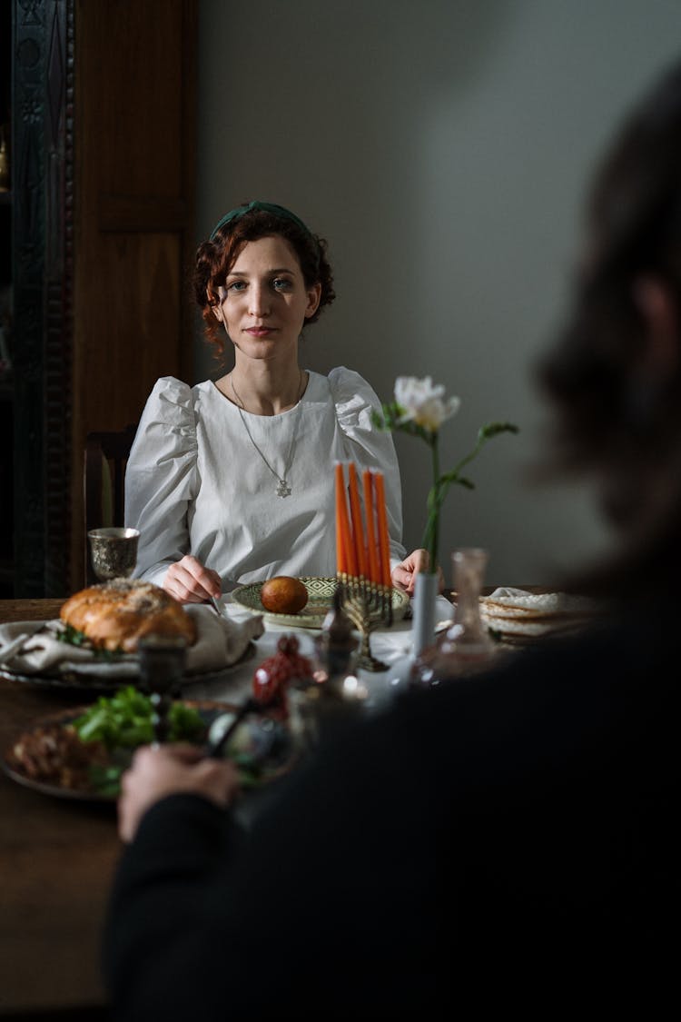 Photo Of Woman Wearing White Top