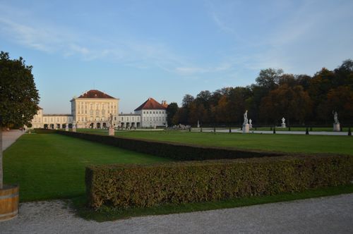 Free A serene view of Nymphenburg Palace with autumn foliage and manicured gardens in Munich. Stock Photo