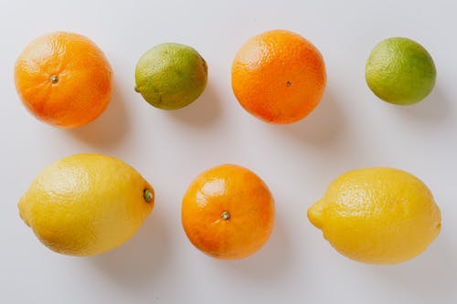 Free Photo Of Orange Near Lemon Stock Photo