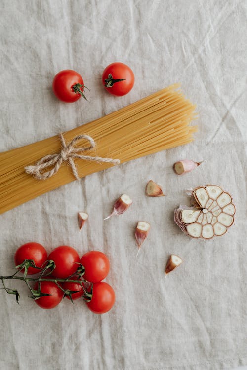 Photo Of Pasta Near Tomatoes