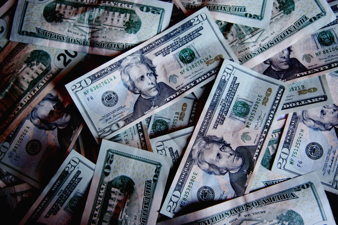 Free Photograph of a Pile of Dollar Bills Stock Photo