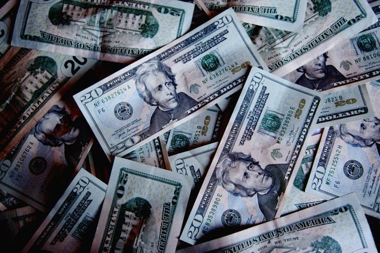 Photograph Of A Pile Of Dollar Bills