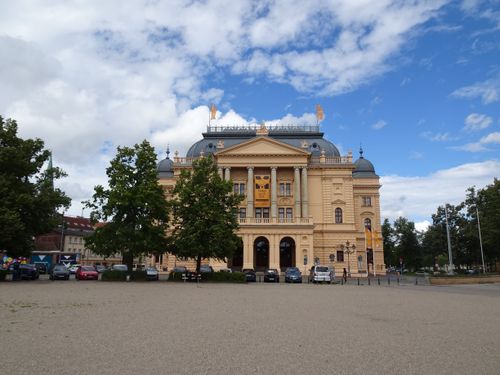 Free Front view of the historic theater in Schwerin, Germany, captured on a bright summer day. Stock Photo