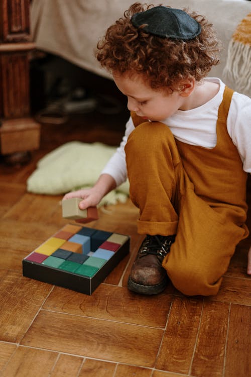 Boy Playing With Blocks