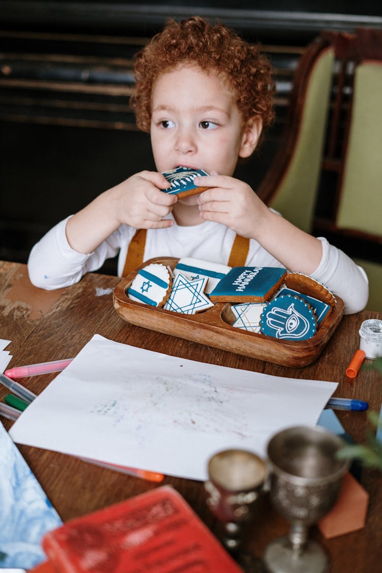 Boy Eating A Cookie