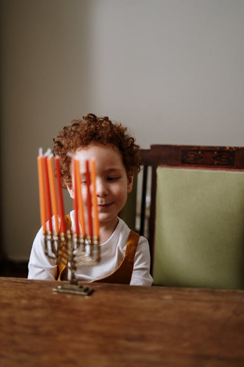 Free Boy With a Menorah Stock Photo