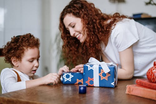 Free Woman and Son With Gifts Stock Photo