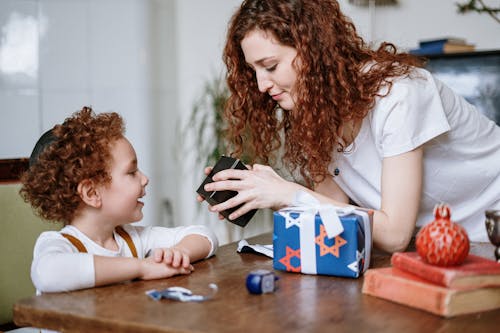 Free Mother and Son With a Gift Stock Photo