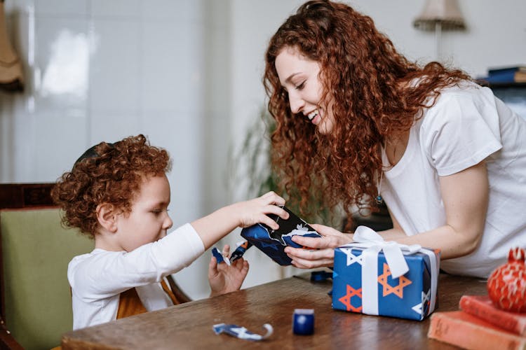 Mother And Son With Gifts