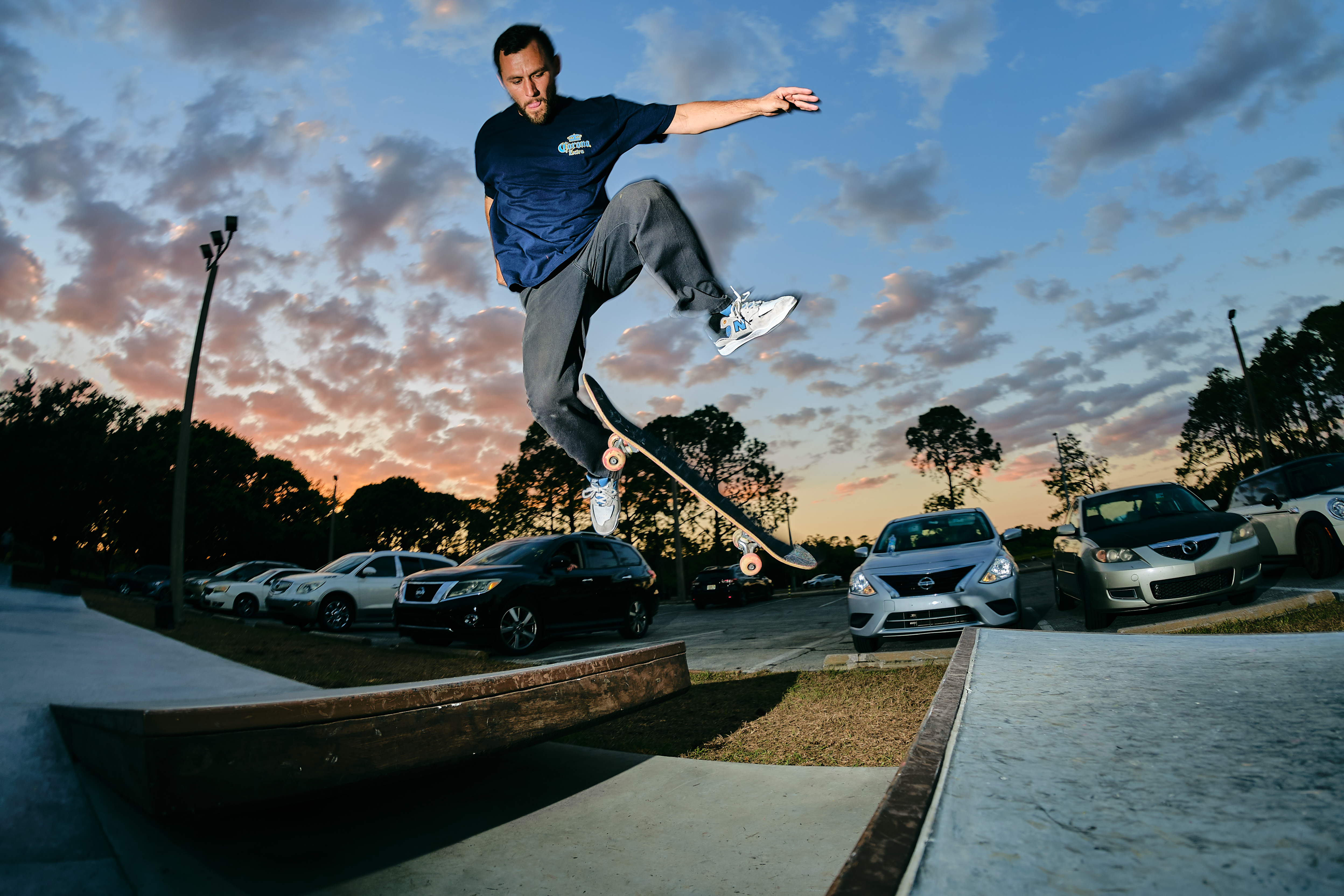 Skateboarder Performs Mid-Air Trick at Sunset · Free Stock Photo