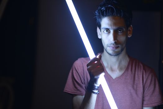 Man Holding Light Saber Sword