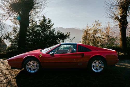 Free Stunning Ferrari 328 GTS photographed in a picturesque setting in Olgiasca, Lombardia, Italy. Stock Photo