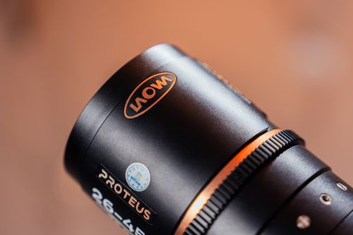 Free Detailed close-up image of a professional camera lens with technical features highlighted. Stock Photo