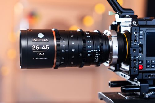 Free Close-up shot of a 26-45 T2.9 anamorphic lens on a professional camera rig indoors. Stock Photo