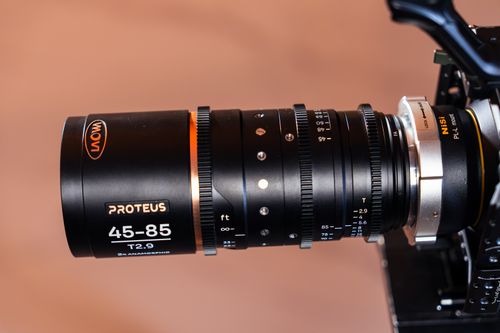 Free High-quality close-up showing a Laowa Proteus anamorphic lens mounted on a camera. Stock Photo