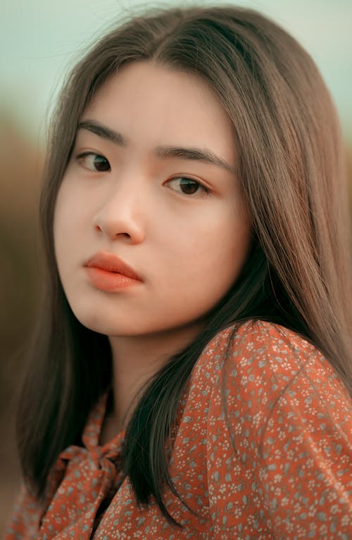 Young Woman Wearing A Floral Shirt