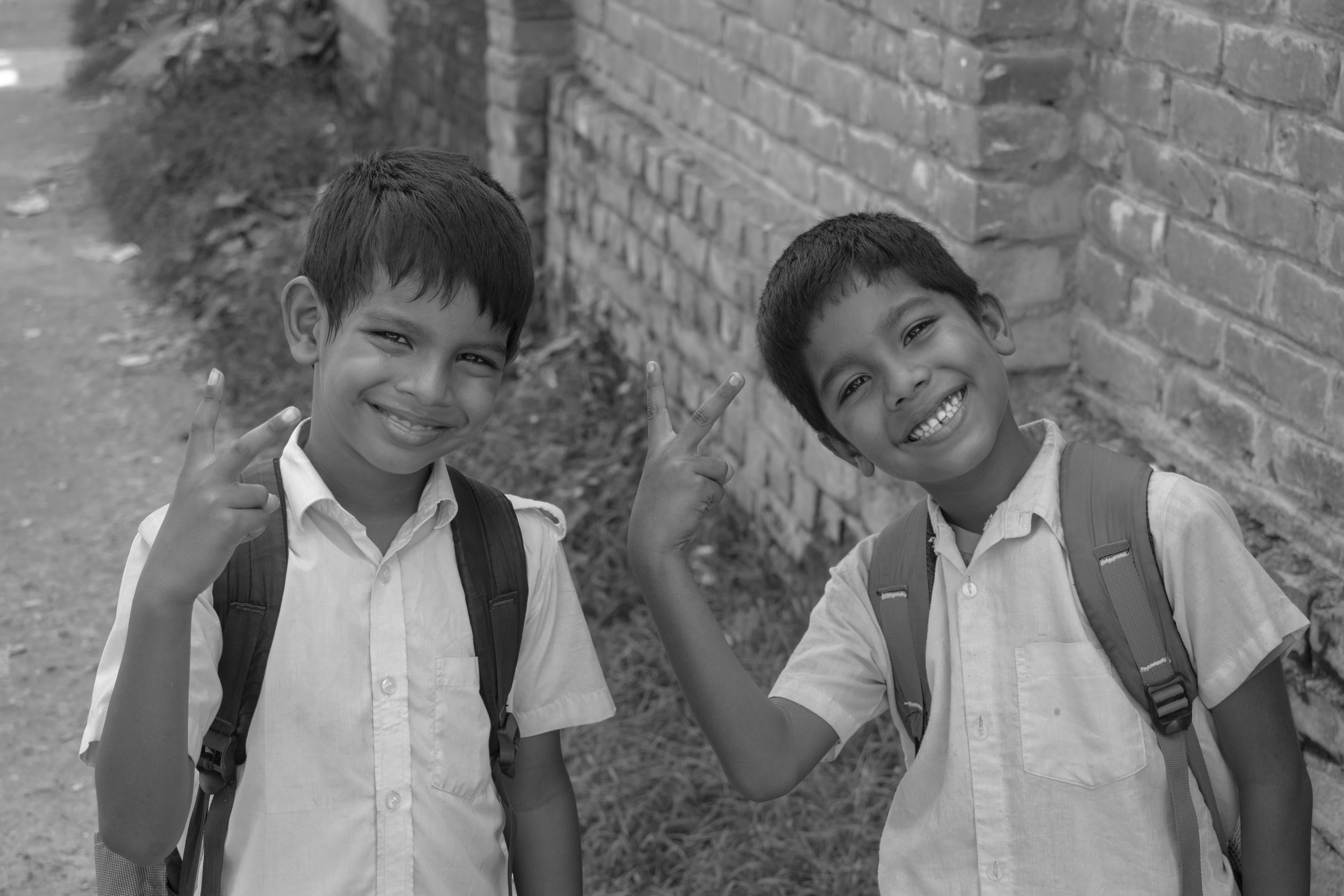 Joyful Schoolchildren Smiling Outdoors · Free Stock Photo