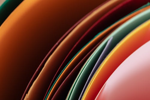 Free Closeup abstract set of colored paper surrounded together in studio Stock Photo