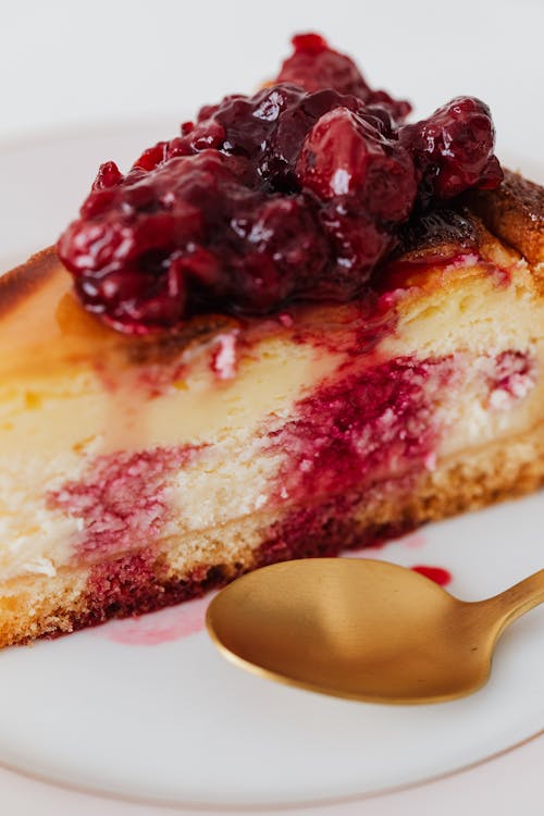 Piece of cherry cheesecake on plate