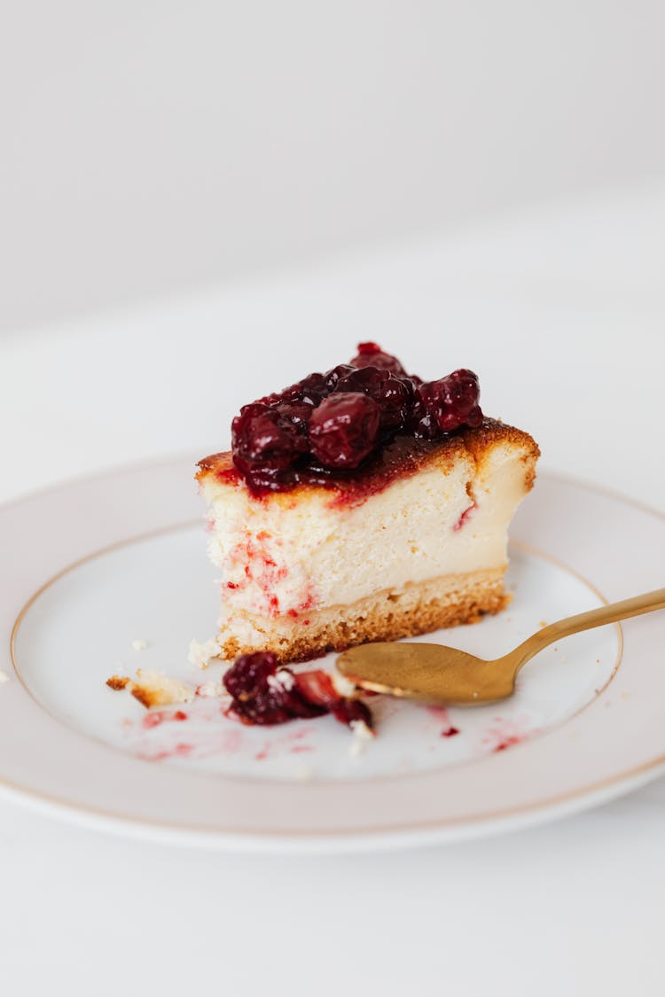 Bitten Piece Of Berry Cheesecake