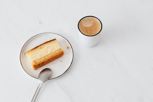 Free Hot coffee and homemade dessert on table Stock Photo