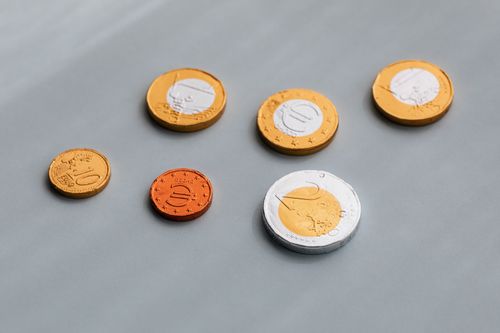 Free From above of various coins of European Union in circulation arrangement on gray table Stock Photo