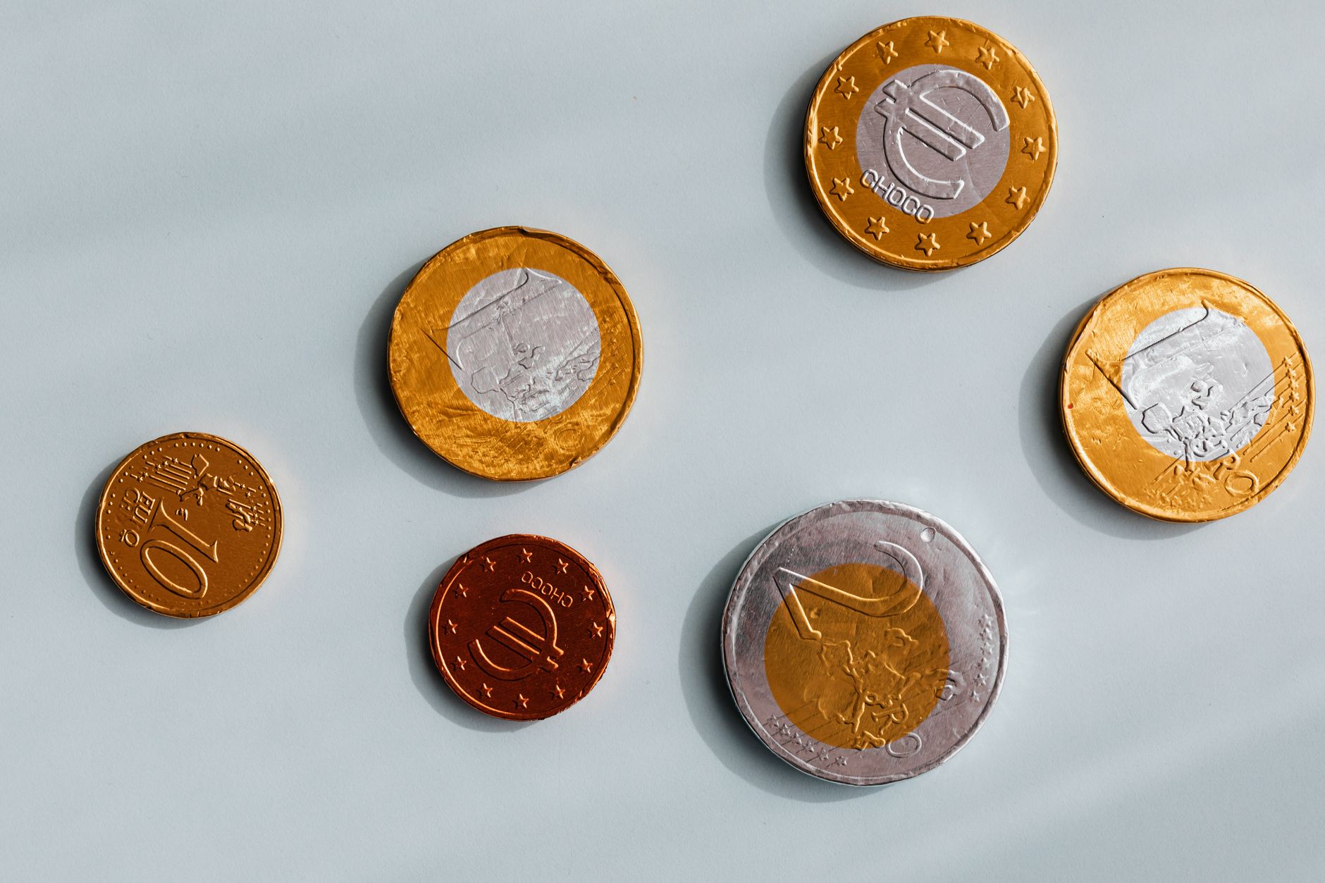 Top view of coins diverse denomination of European Union placed on marble surface