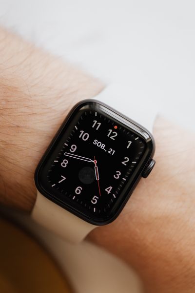 Smartwatch with a large digital clock face on wrist