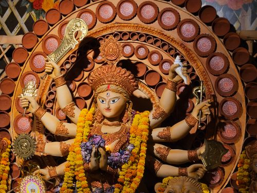 Free Colorful Durga idol adorned with flowers during Durga Puja in Kolkata, India. Stock Photo