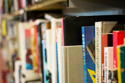 Free stock photo of blurry, books, bookshelf