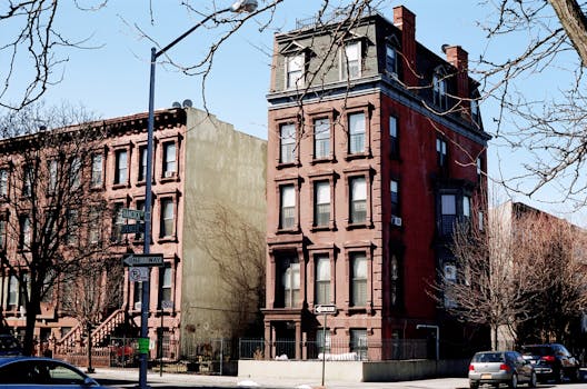 A daylight view of historic brownstone architecture on Hancock Street, Brooklyn, NYC. by Brandon Nickerson