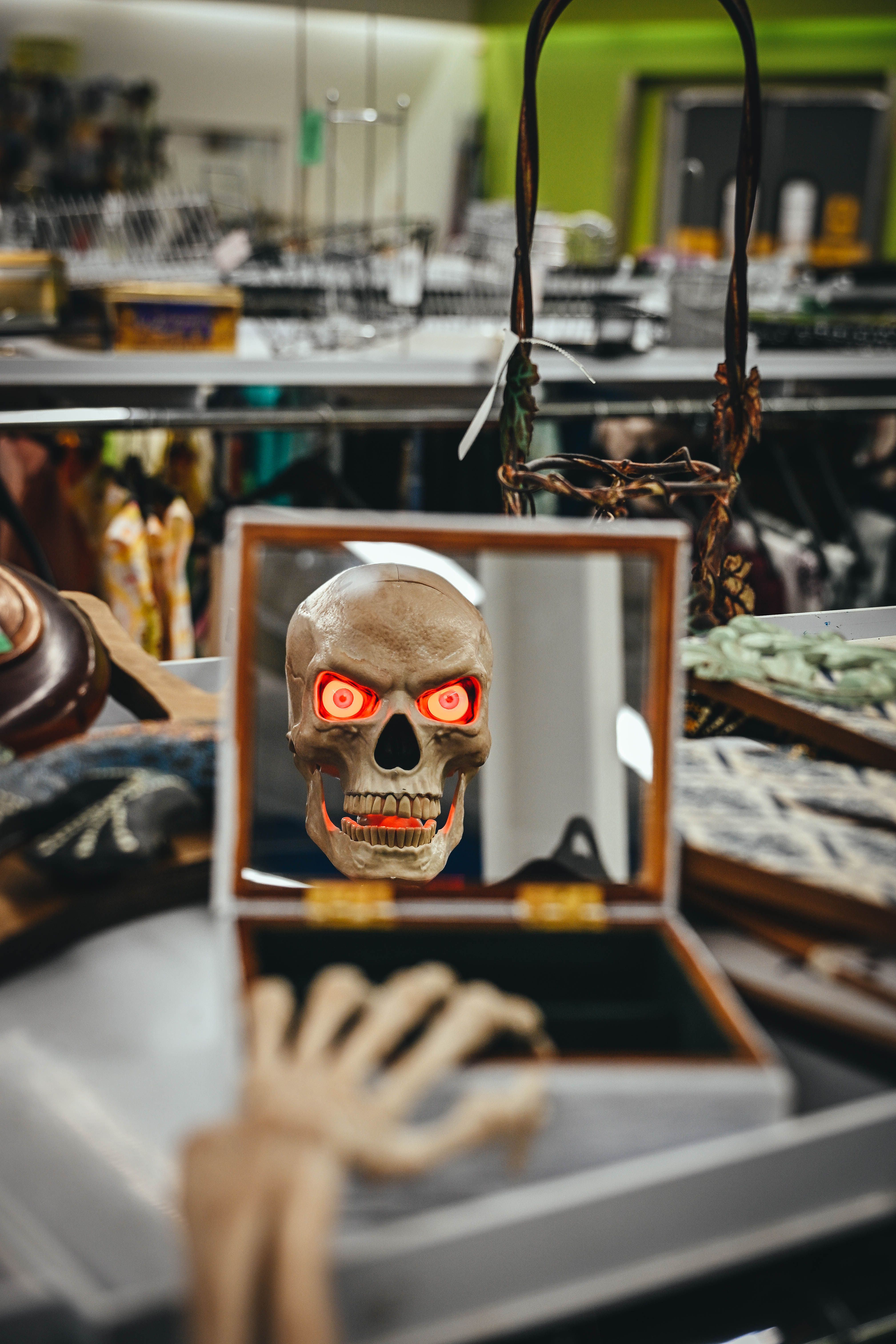 Spooky Skull Reflecting in Mirror with Red Eyes · Free Stock Photo